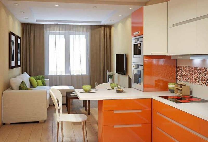 Elongated kitchen-living room with bright furniture