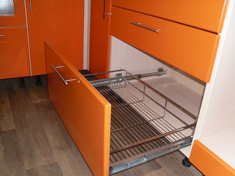 Drawer with basket in the kitchen unit