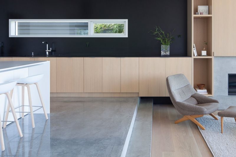 Gray surface of the podium floor in the kitchen-living room