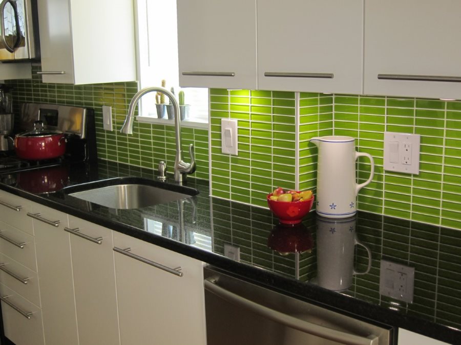 Narrow green tile on a kitchen apron