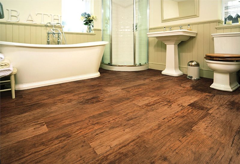 Imitation of old wooden flooring on the bathroom floor