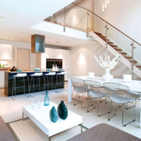 Art Nouveau living room kitchen with staircase