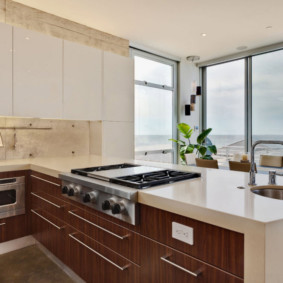 Panoramic windows in the kitchen of a city apartment