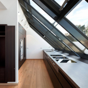 Attic kitchen with large windows