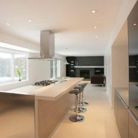 Metal hood over the kitchen island