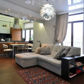 Chandelier over the corner sofa