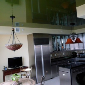 Dark green ceiling with shiny surface