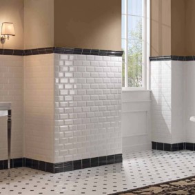 White rectangular tiles in the bathroom of a country house