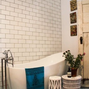 Wicker furniture in a bathroom interior