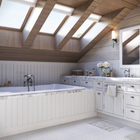 Bright bathroom in the attic of a country house