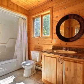 Oval mirror in a black frame