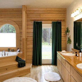 Corner bath on a wooden podium