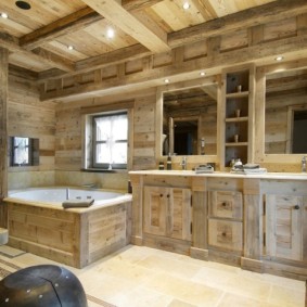 Oak furniture in the bathroom of a country house