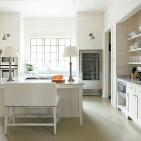 Cookware on open shelves.