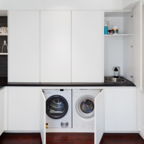 White facades of kitchen furniture