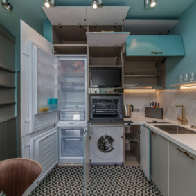 Cupboard for integrated kitchen appliances