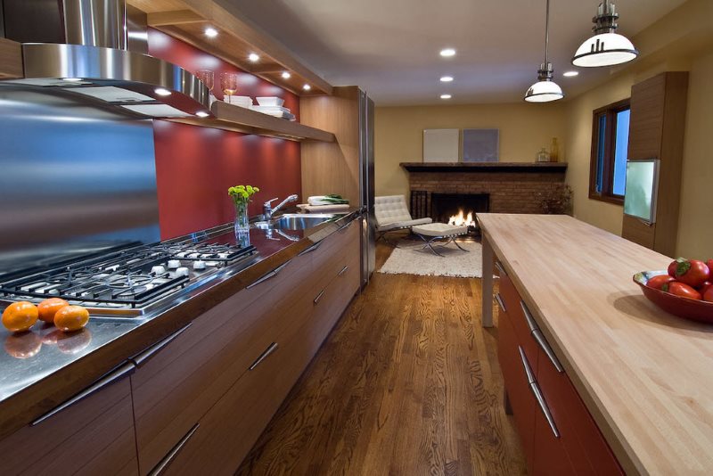Parallel layout of the kitchen of a private house in modern style