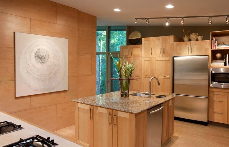 Decorating the walls of the kitchen with wood paneling