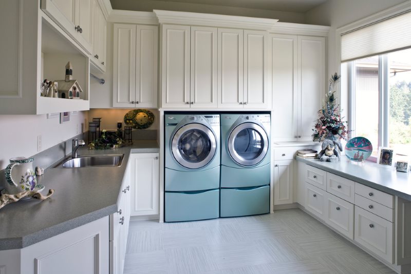Built-in washing machines in the kitchen of a private house
