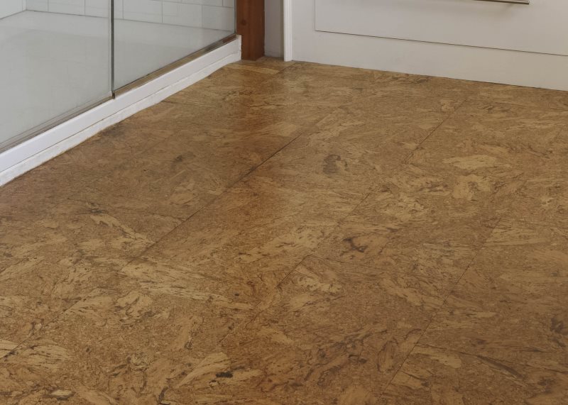 Cork flooring in front of the shower