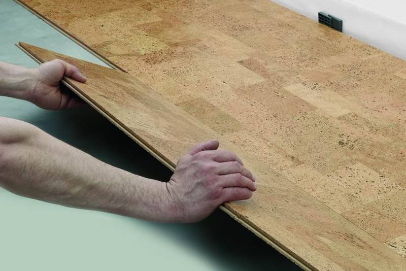 Laying cork panels on the bathroom floor