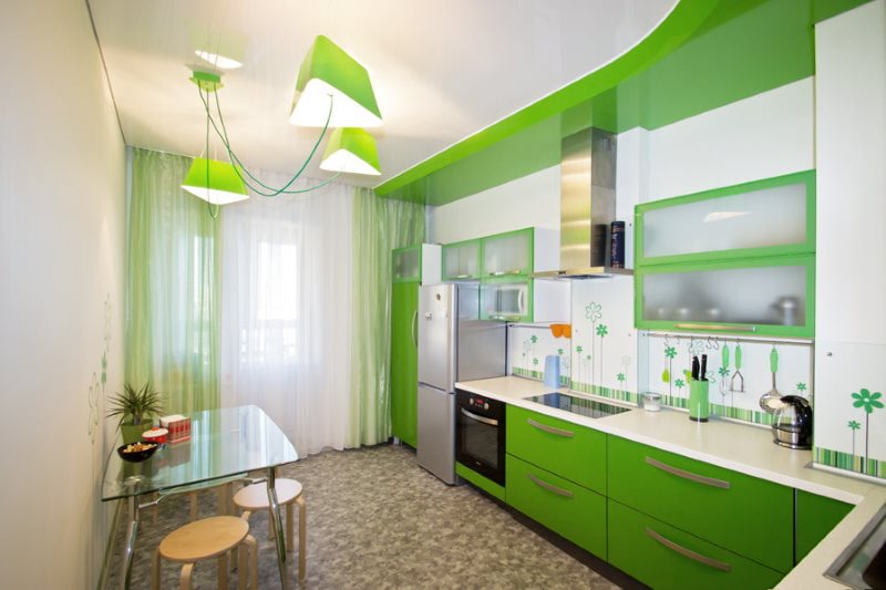 Green color in the corner kitchen interior