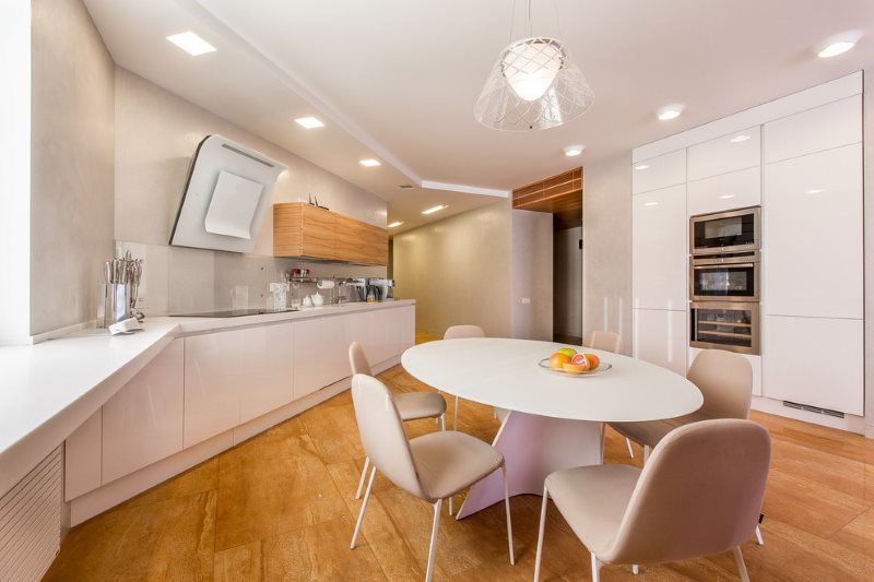 Zoning a white kitchen with lighting