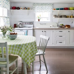 kitchen in a wooden house with open shelves