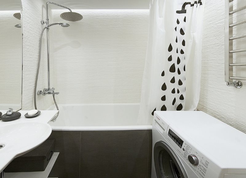 Narrow washing machine in a separate bathroom