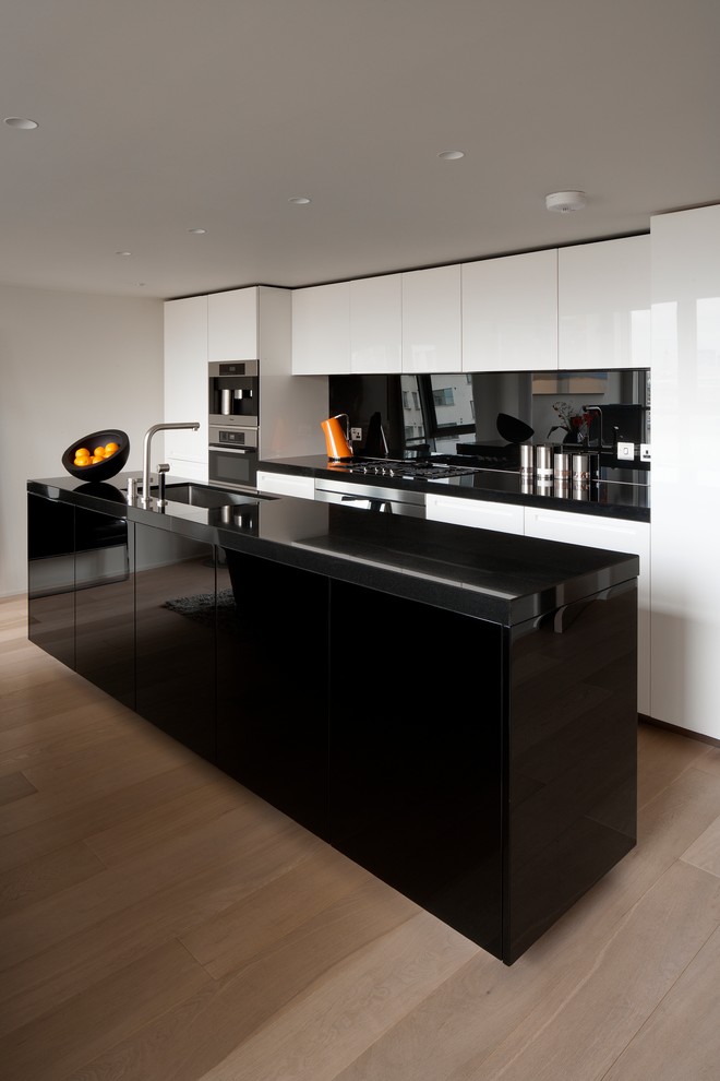 Black kitchen island with sink