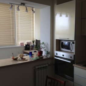 kitchen combined with a balcony