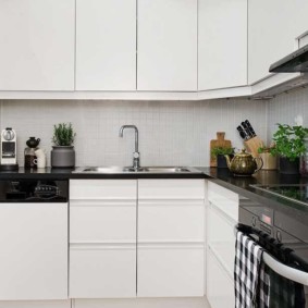 L-shaped set with white facades