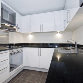 Overhead light on hanging cabinets