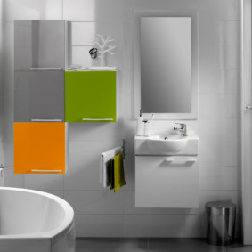 Bright doors on the cabinets in the bathroom