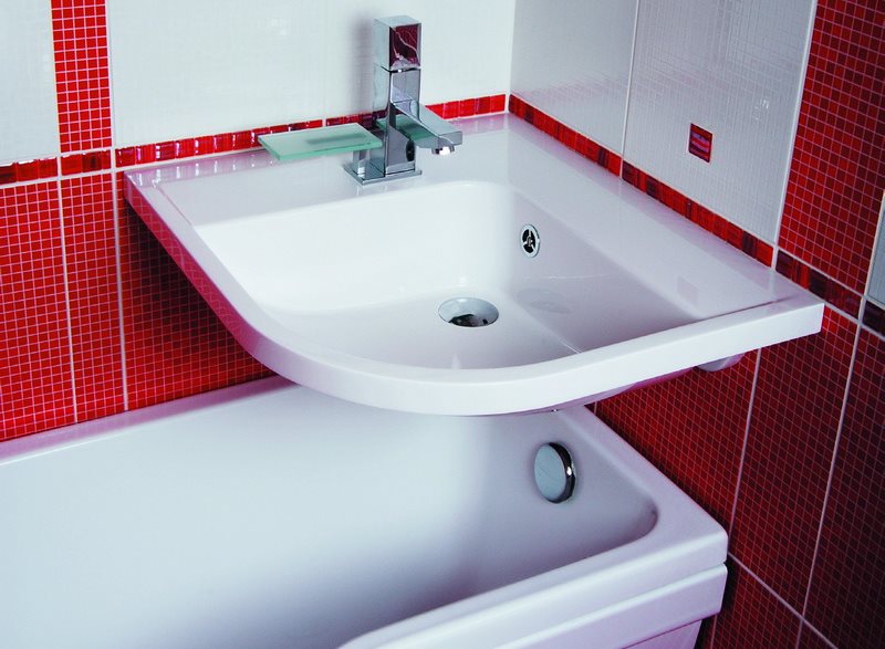 Corner sink over a small bathtub