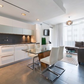 kitchen combined with a balcony design photo