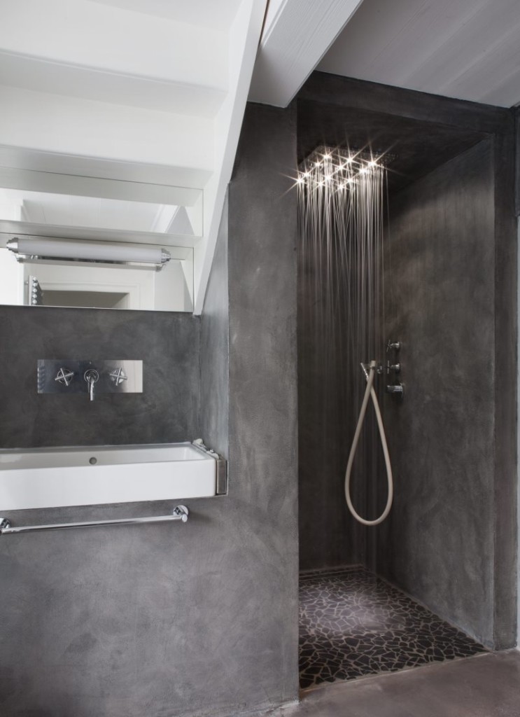 Illuminated shower head in a bathroom without a toilet