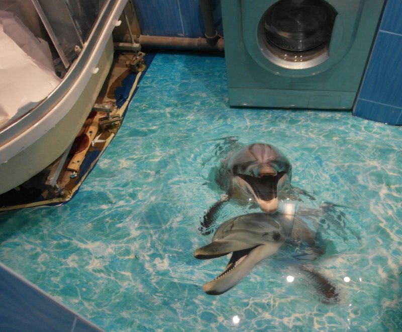 Bulk floor with dolphins in a small bathroom