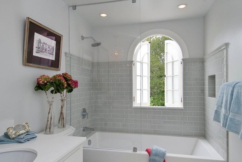 Window on the wall of a small bathroom