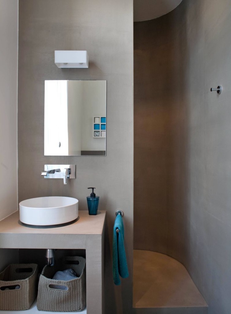 Gray bathroom walls with shower without toilet