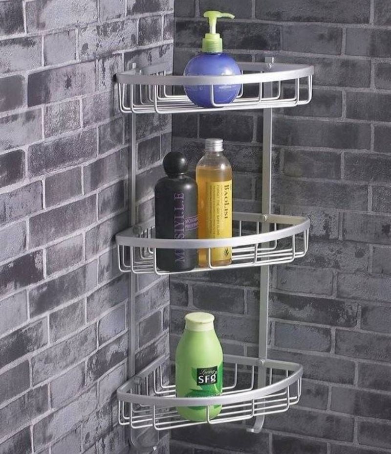 Toiletries on the corner shelf in the bathroom
