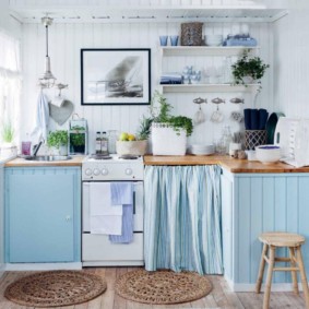 kitchen in a wooden house white-blue