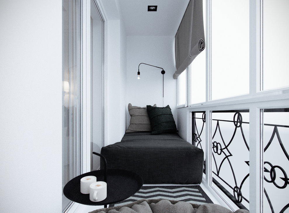 Matelas noir sur un balcon vitré