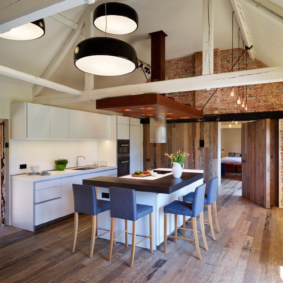 kitchen with a dark floor photo