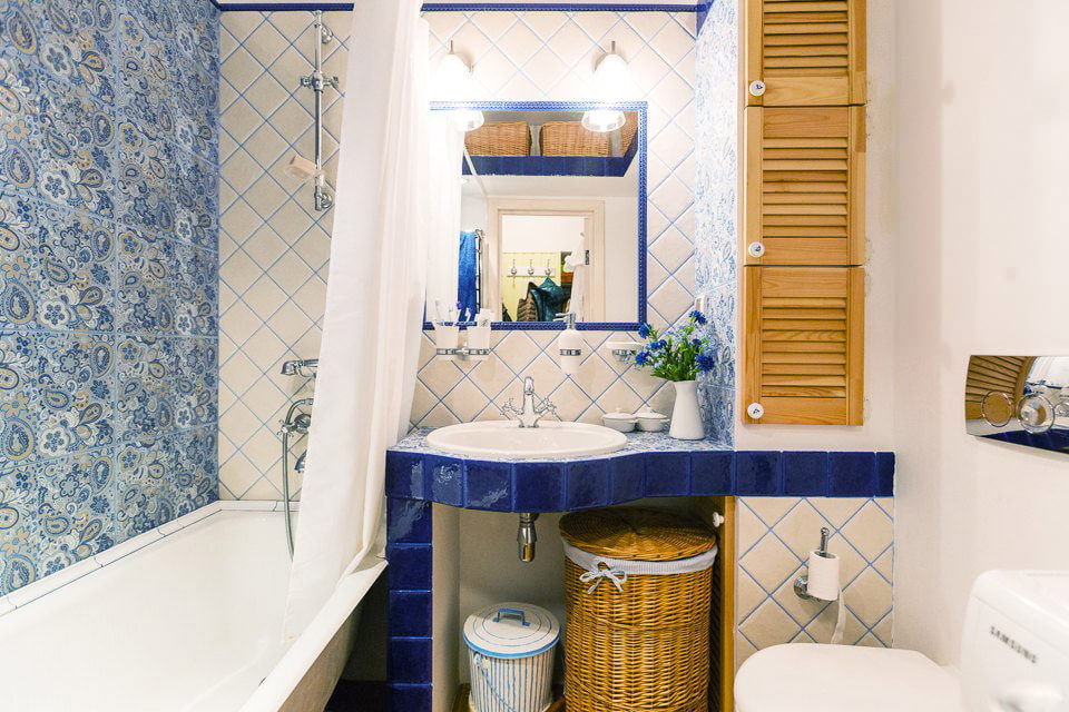 Doors of slats on the bathroom wall