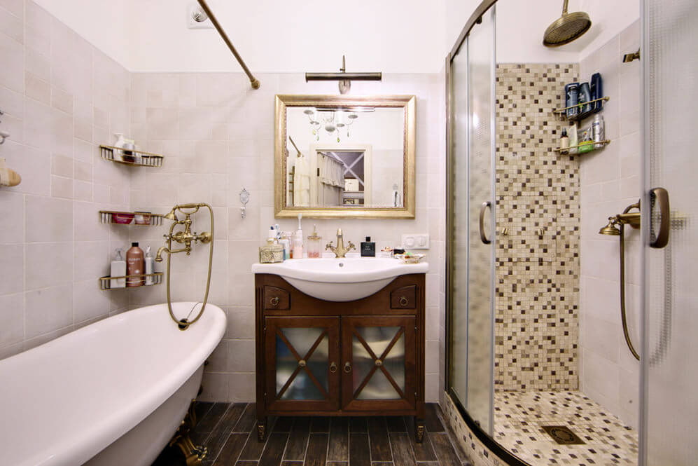 Light ceramic tiles in a provence style bathroom