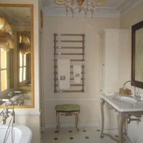 Chrome towel rail on the wall in the bathroom