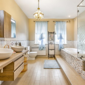 Overhead sinks on hanging tables