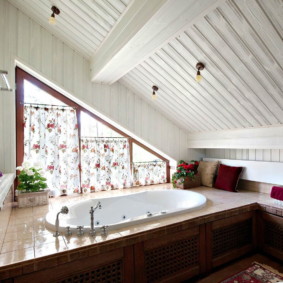 Wooden cladding for sloping ceilings