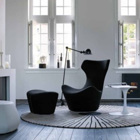 Boardwalk in living room with high ceiling